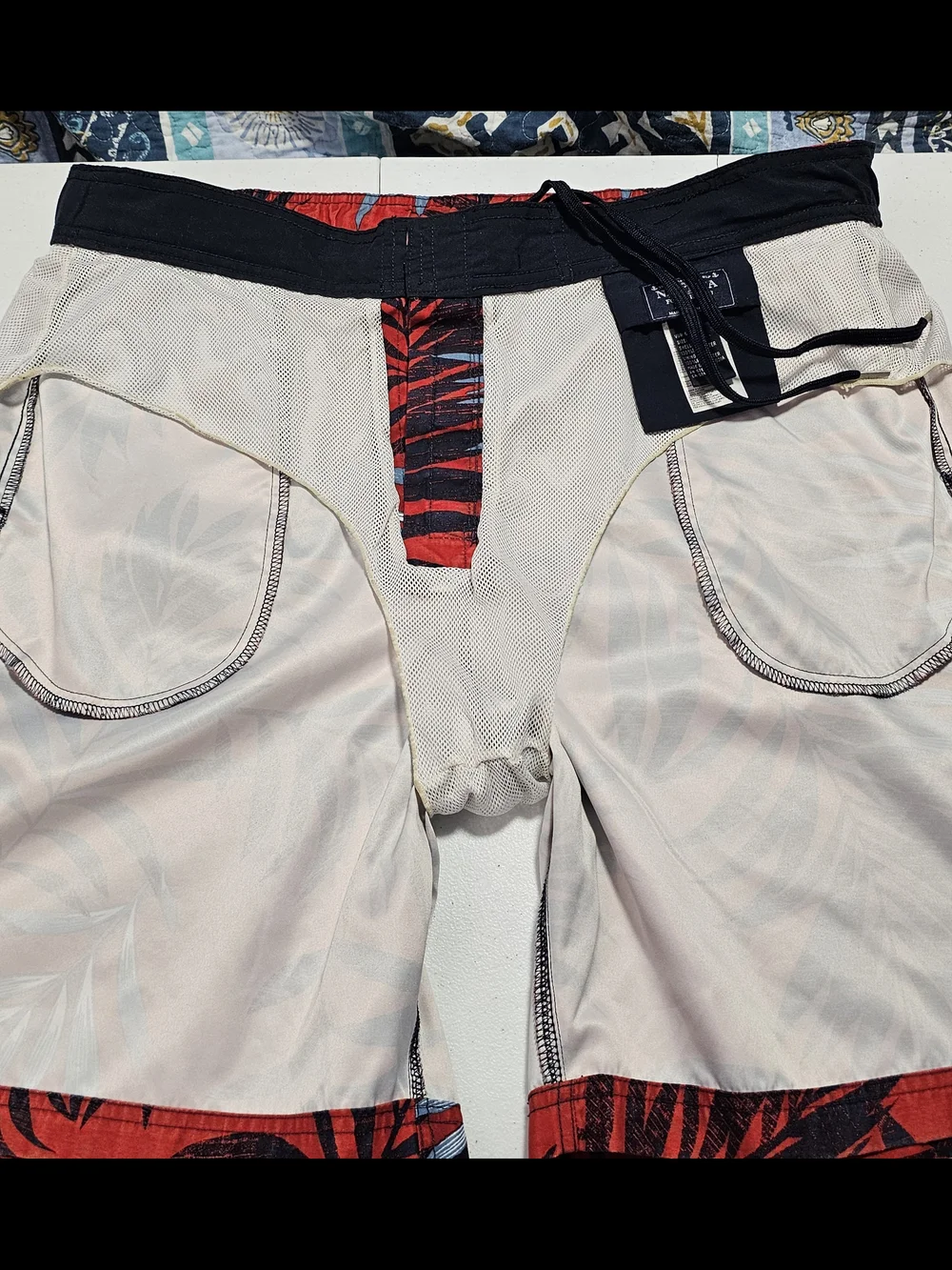 Nautica Red Swim Shorts with Black and Light Blue Tropical Leaf Print Large